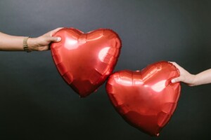 two red heart balloons