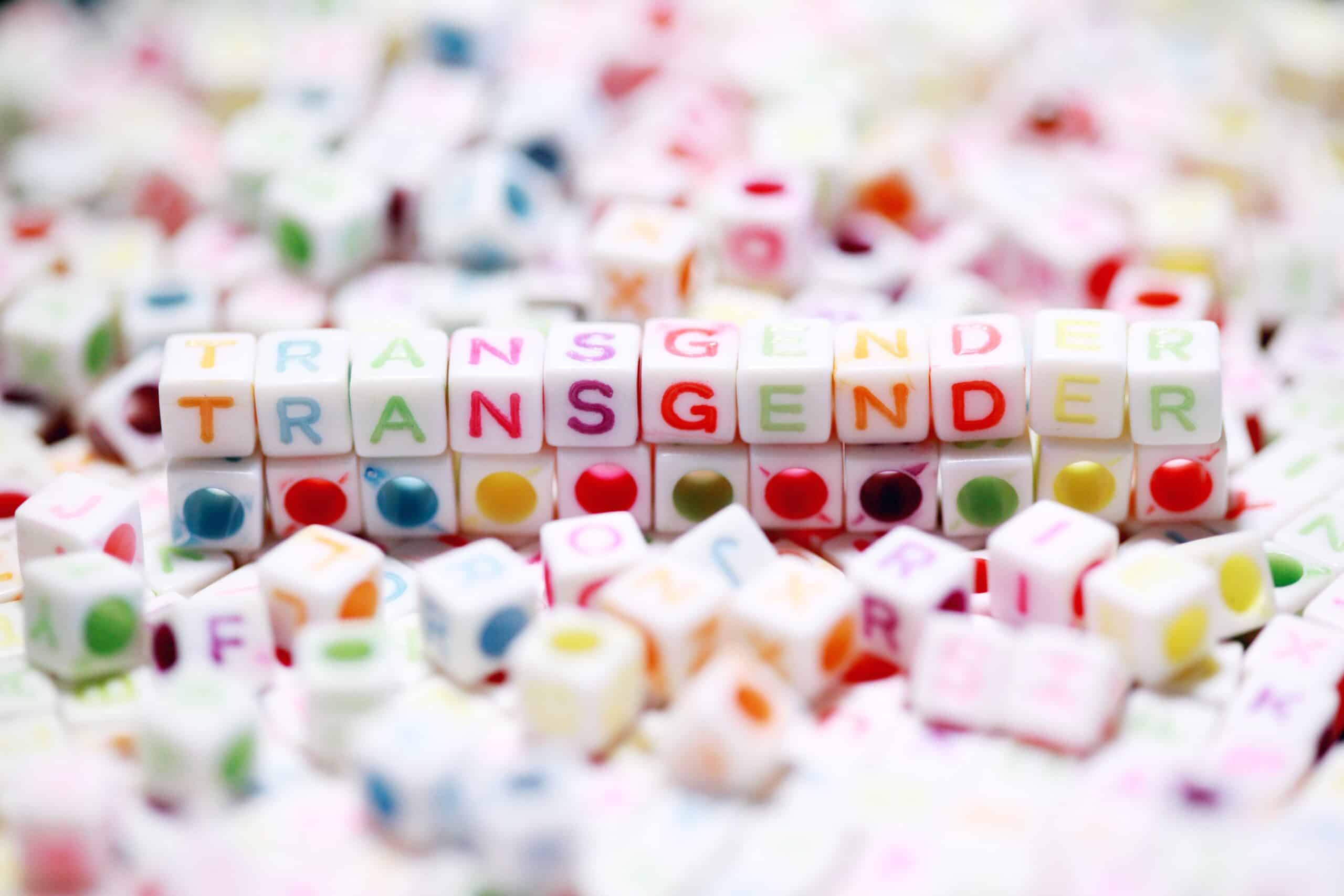beads spelling out Transgender