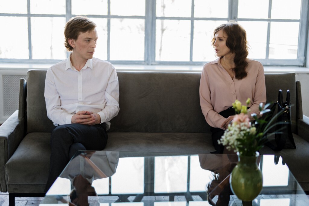 Couple sitting on couch