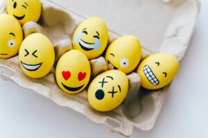 Eggs painted as emojis